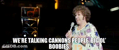 A Woman Is Holding A Microphone And Saying We 'Re Talking Cannons People Big Ol Boobies GIF