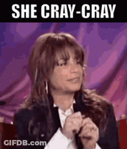 A Woman Is Holding A Microphone With The Words She Cray-Cray Above Her GIF