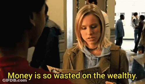 A Woman Is Holding A Piece Of Paper With The Words Money Is So Wasted On The Wealthy GIF