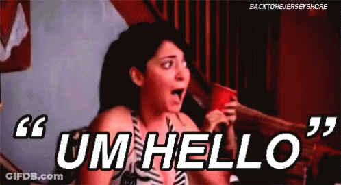 A Woman Is Holding A Red Cup And Saying Um Hello . GIF