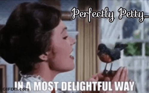 A Woman Is Holding A Small Bird In Her Hands And Singing To It . GIF
