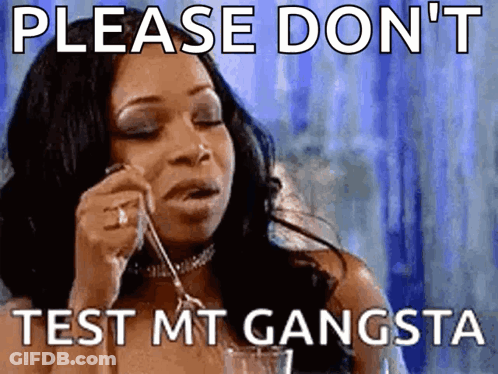 A Woman Is Holding A Spoon In Her Mouth And Says Please Don 'T Test Mt Gangsta . GIF