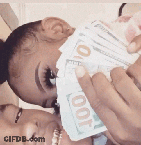 A Woman Is Holding A Stack Of 100 Dollar Bills In Front Of Her Face GIF