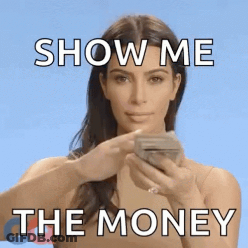 A Woman Is Holding A Stack Of Money In Her Hands . GIF