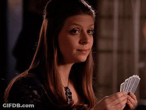 Woman Holding Cards With A And R GIF