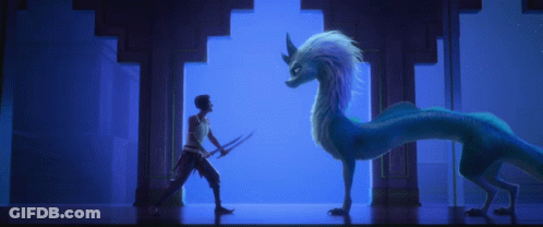 A Woman Is Holding A Sword In Front Of A Blue Dragon In A Room . GIF