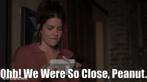 A Woman Is Holding A Tablet And Says " Ohh! We Were So Close, Peanut " GIF