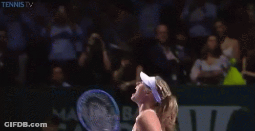 A Woman Is Holding A Tennis Racquet In Front Of A Tennis Tv Logo GIF