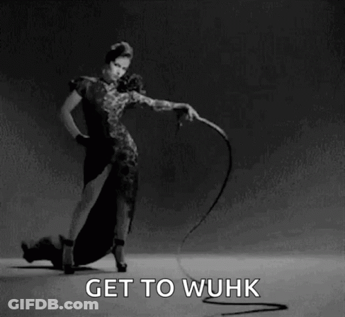 A Woman Is Holding A Whip In A Black And White Photo With The Words Get To Wuhk Below Her GIF