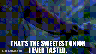 A Woman Is Holding An Onion And Saying That 'S The Sweetest Onion I Ever Tasted GIF