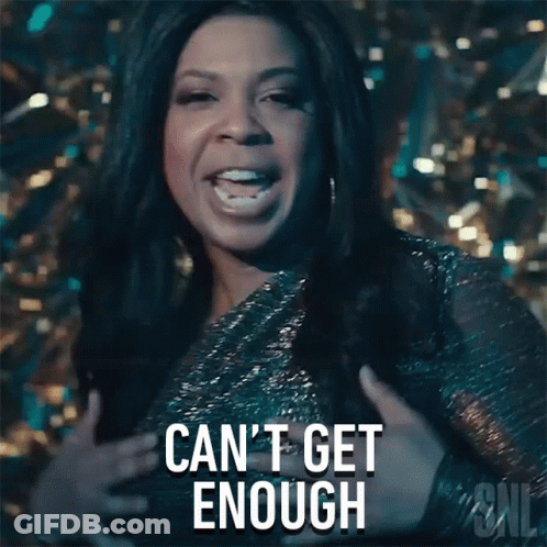 A Woman Is Holding Her Chest And Says Can 'T Get Enough GIF