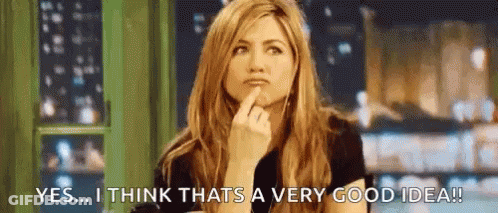 A Woman Is Holding Her Finger To Her Chin And Thinking About A Very Good Idea . GIF
