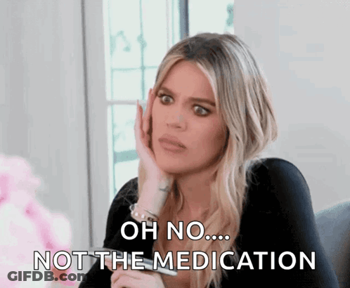 A Woman Is Holding Her Hand To Her Face And Saying Oh No Not The Medication GIF