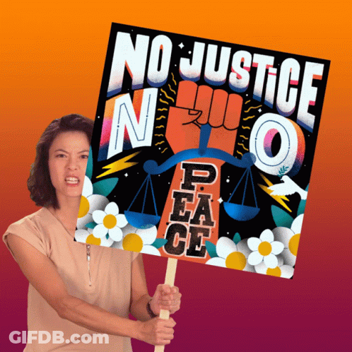 A Woman Is Holding Up A Sign That Says No Justice In Peace GIF