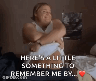 A Woman Is Hugging Her Stomach With The Words Here 'S A Little Something To Remember Me By .. On The Bottom GIF