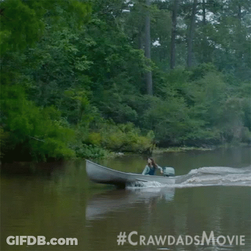 A Woman Is In A Boat On A River With The #Crawdadsmovie Written On The Bottom GIF