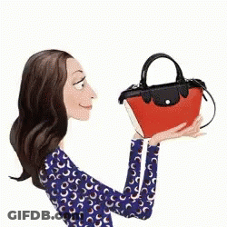 A Woman Is Kissing A Red Purse In Her Hand . GIF