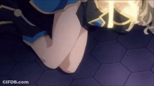 A Woman Is Kneeling Down With Her Legs Crossed And A Light Shining On Her Thighs . GIF
