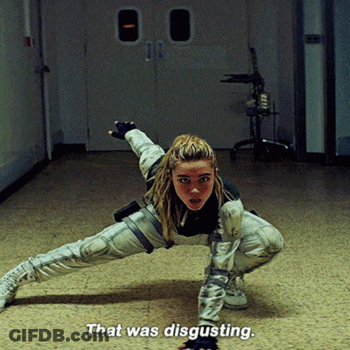 A Woman Is Kneeling Down With The Words That Was Disgusting Written Below Her GIF