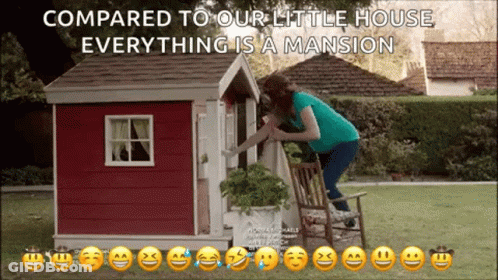 A Woman Is Kneeling On A Chair In Front Of A Playhouse With The Words Compared To Your Little House Everything Is A Mans GIF