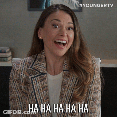 A Woman Is Laughing And Says Ha Ha Ha Ha GIF