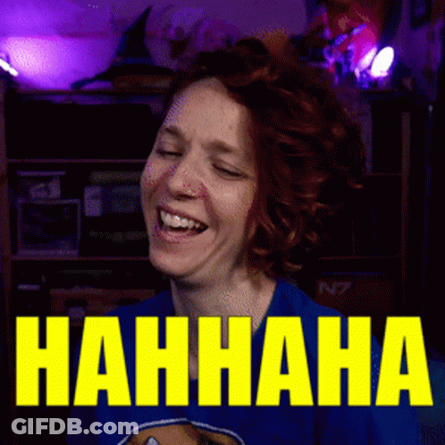 A Woman Is Laughing In Front Of A Sign That Says Nahhaha GIF