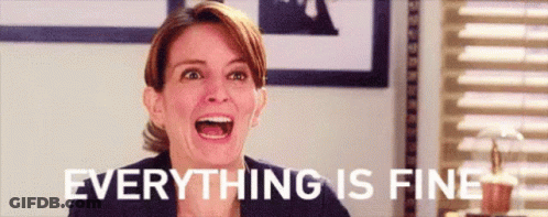 A Woman Is Laughing With Her Mouth Open And The Words `` Everything Is Fine '' Above Her . GIF