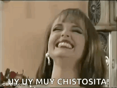 A Woman Is Laughing With Her Mouth Open And The Words Uy Uy Muy Chistosita . GIF