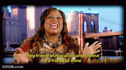 A Woman Is Laughing With The Words Any Friend Of Macaroni And Cheese Is A Friend Of Mine GIF