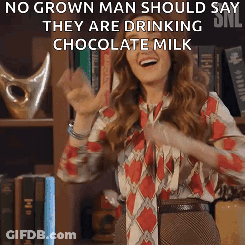 A Woman Is Laughing With The Words No Grown Man Should Say They Are Drinking Chocolate Milk Above Her GIF