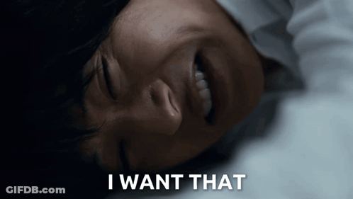 A Woman Is Laying Down With Her Eyes Closed And The Words I Want That Written Below Her GIF