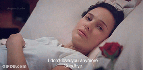 A Woman Is Laying In A Hospital Bed With A Rose And Says " I Don 'T Love You Anymore " GIF