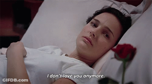 A Woman Is Laying In A Hospital Bed With A Rose And Says I Don T Love You Anymore . GIF