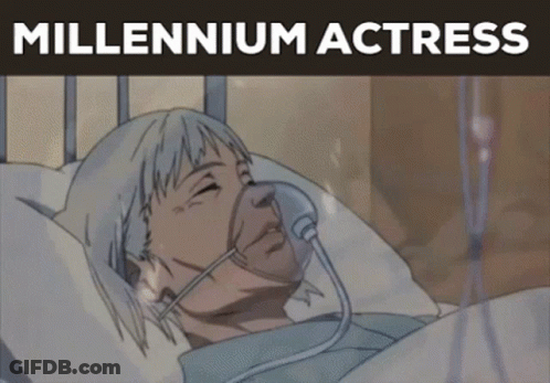 A Woman Is Laying In A Hospital Bed With An Oxygen Mask On Her Face And The Words " Millennium Actress " Above Her GIF