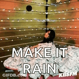 A Woman Is Laying In A Pile Of Money With The Words Make It Rain GIF