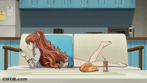 A Woman Is Laying On A Couch With A Bag Of Chips And A Drink GIF