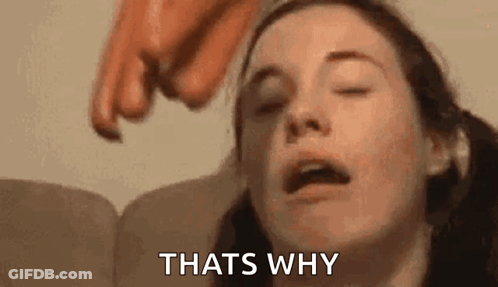 A Woman Is Laying On A Couch With Her Eyes Closed And A Person Pointing At Her Face . GIF