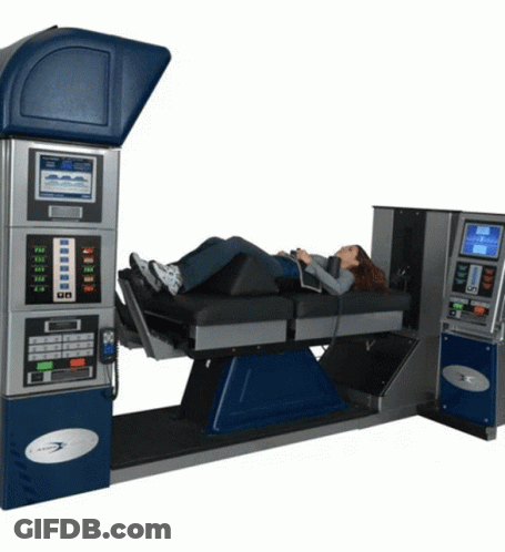 A Woman Is Laying On A Machine That Has A Display That Says ' Sd ' On It GIF