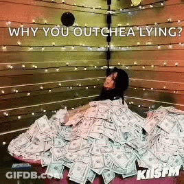 A Woman Is Laying On Top Of A Pile Of Money With The Caption Why You Outchea Lying GIF