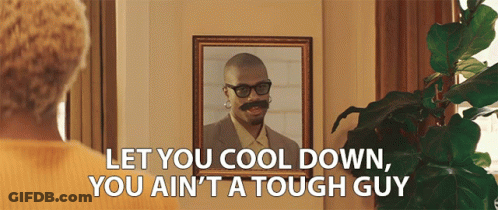 A Woman Is Looking At A Picture Of A Man With Glasses And A Mustache And Says Let You Cool GIF