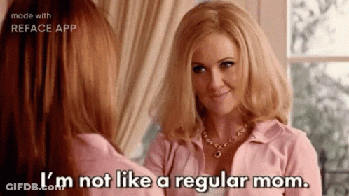 A Woman Is Looking At Herself In A Mirror And Saying `` I 'M Not Like A Regular Mom '' . GIF