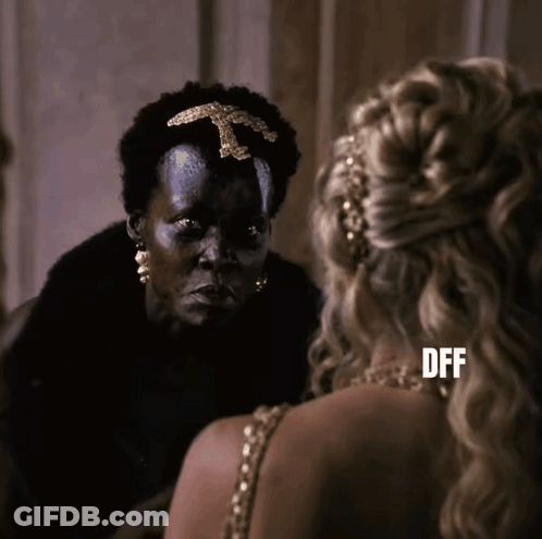A Woman Is Looking At Herself In A Mirror And The Word Dff Is On The Bottom Right GIF