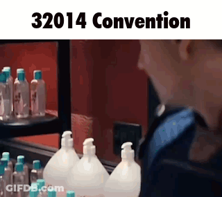 A Woman Is Looking At Herself In A Mirror In Front Of A Shelf Full Of Bottles Of Hand Sanitizer . GIF
