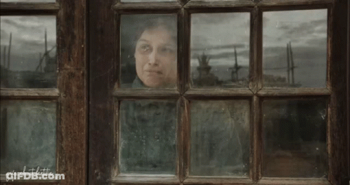A Woman Is Looking Out Of A Window With The Words " Life About Little " Written On The Bottom GIF