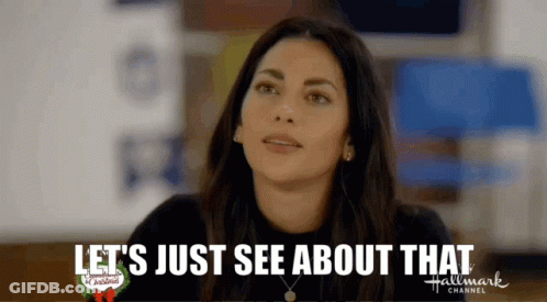 A Woman Is Looking Up And Saying `` Let 'S Just See About That '' GIF