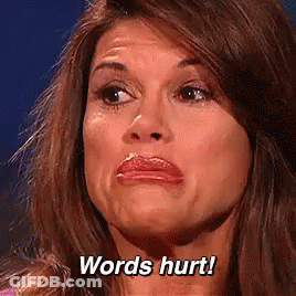 A Woman Is Making A Face And Saying Words Hurt ! GIF