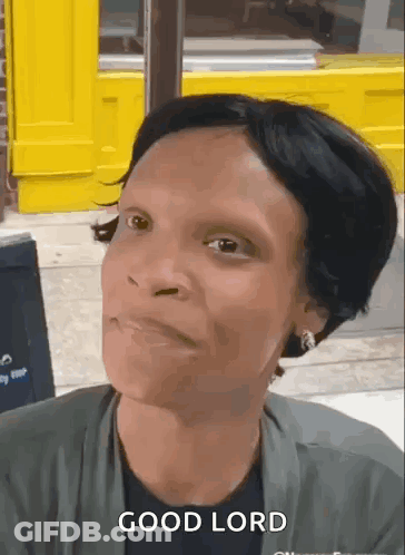 A Woman Is Making A Face And Says Good Lord GIF