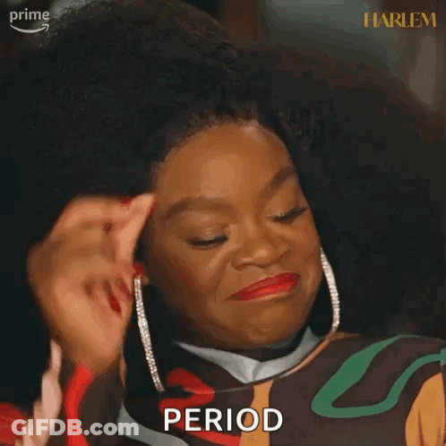 A Woman Is Making A Funny Face And Holding Her Hand To Her Forehead . GIF