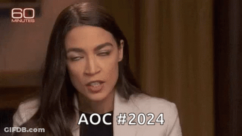 A Woman Is Making A Funny Face And Saying Aoc # 2024 While Sitting In A Chair . GIF