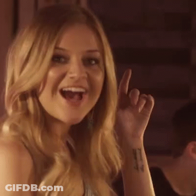 A Woman Is Making A Funny Face And Saying `` I Like That '' While Giving A Thumbs Up . GIF
